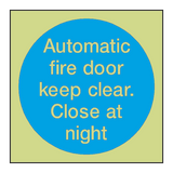 Automatic Fire Door Keep Clear Close At Night Photoluminescent Sign - PVC Safety Signs