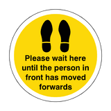 Please Wait Until Person In Front Has Moved Floor Sticker - Yellow - PVC Safety Signs